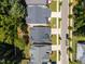 New homes feature manicured lawns and modern design near tree-lined streets at 3057 Eden Harbor Ct, Raleigh, NC 27613