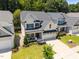 Beautifully landscaped property showcasing a well-maintained lawn, and a welcoming facade at 3057 Eden Harbor Ct, Raleigh, NC 27613