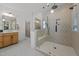 Modern bathroom with patterned tile, glass-enclosed shower, and stylish vanity, creating a spa-like experience at 3057 Eden Harbor Ct, Raleigh, NC 27613