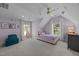 Comfortable bedroom with a hammock chair, stylish furniture, soft carpet, and natural light at 3057 Eden Harbor Ct, Raleigh, NC 27613