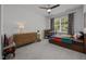 Bright bedroom with a colorful bed, dresser, and playful decor, perfect for a space at 3057 Eden Harbor Ct, Raleigh, NC 27613