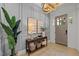 Stylish entryway with elegant wall paneling, decor, and a rustic console table at 3057 Eden Harbor Ct, Raleigh, NC 27613