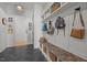 Bright mudroom features a bench with storage, hooks, and stylish decor, creating an organized space at 3057 Eden Harbor Ct, Raleigh, NC 27613