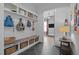Mudroom with slate tile floor, cubbies, and storage baskets, and is conveniently located near the entrance at 3057 Eden Harbor Ct, Raleigh, NC 27613