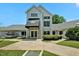 Front view of the Chapel Hill Tennis Club building with manicured landscaping and ample parking at 311 Westbrook Dr, Carrboro, NC 27510