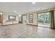 Open living room featuring tile flooring, a view to the outside, and plenty of open space at 311 Westbrook Dr, Carrboro, NC 27510