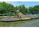 Community playground with slides, swings, and climbing structures perfect for families and children at 311 Westbrook Dr, Carrboro, NC 27510