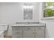 Bathroom featuring granite countertop, white cabinets, toilet and mirror at 3218 Seven Springs Rd, Hillsborough, NC 27278
