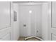 The spacious laundry room with hookups has a white interior at 3218 Seven Springs Rd, Hillsborough, NC 27278