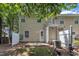 Backyard view featuring neutral siding, fenced area, AC unit, and a small patio at 3352 Tarleton W, Durham, NC 27713