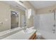 Bathroom showcasing a combined tub and shower with white fixtures and neutral wall color at 3352 Tarleton W, Durham, NC 27713