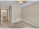 Bedroom featuring a neutral wall color, carpeted flooring, and a view into the bathroom at 3352 Tarleton W, Durham, NC 27713