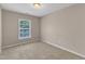 Bedroom featuring a neutral wall color, carpeted flooring, and a view from a window at 3352 Tarleton W, Durham, NC 27713