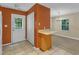 Cozy kitchen with a door to the backyard, a snack bar, and modern appliances at 3352 Tarleton W, Durham, NC 27713