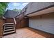 Spacious back deck with stairs leading up to a second level, perfect for outdoor entertaining and relaxing at 346 Summerwalk Cir, Chapel Hill, NC 27517
