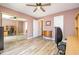 Bedroom with wood-look floors, ceiling fan, mirrored closet doors, and a chest of drawers at 346 Summerwalk Cir, Chapel Hill, NC 27517