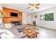 Bright living area showcases a fireplace, contemporary furnishings, and ample natural light at 346 Summerwalk Cir, Chapel Hill, NC 27517