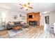 Cozy living room features a fireplace, comfortable seating, and stylish decor for relaxing and entertaining at 346 Summerwalk Cir, Chapel Hill, NC 27517