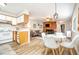 Open-concept living space with modern finishes, seamlessly integrating the kitchen, dining, and living areas at 346 Summerwalk Cir, Chapel Hill, NC 27517