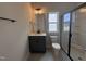 Clean bathroom with modern vanity, shower with glass door, and contemporary fixtures, providing a spa-like experience at 3509 Bailey Lake Dr, Fuquay Varina, NC 27526