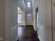 Bright foyer with soaring ceilings, wood floors, and white trim welcomes you into this beautifully designed home at 3509 Bailey Lake Dr, Fuquay Varina, NC 27526