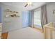 Cozy Bedroom features blue trim, light-colored walls, and hardwood floors at 404 Troy Pl, Raleigh, NC 27609