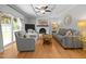Cozy living room with hardwood floors, fireplace, and comfortable seating at 404 Troy Pl, Raleigh, NC 27609