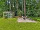 Backyard features shed with a patio at 404 Troy Pl, Raleigh, NC 27609