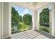 Balcony overlooking a beautiful green space with walking paths and mature trees at 501 Finsbury St # 204, Durham, NC 27703