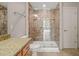 Beautiful bathroom with glass enclosed tiled shower and updated fixtures and hardware at 501 Finsbury St # 204, Durham, NC 27703