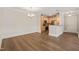 Open dining area with view of the kitchen featuring stainless steel appliances at 501 Finsbury St # 204, Durham, NC 27703