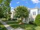 Charming building exterior with well-maintained landscaping and inviting curb appeal at 501 Finsbury St # 204, Durham, NC 27703