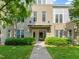 Well-manicured building exterior with lush green landscaping and inviting front entrance walkway at 501 Finsbury St # 204, Durham, NC 27703