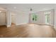 Bright and spacious living area with neutral walls, hardwood floors and exterior access at 501 Finsbury St # 204, Durham, NC 27703