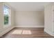 Bright room with hardwood floors, ample natural light and neutral paint at 501 Finsbury St # 204, Durham, NC 27703
