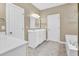 Spacious bathroom with double vanities, ample counter space, and a separate water closet at 5107 Granbury Dr, Durham, NC 27713