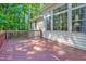 Spacious wooden deck overlooking a private, wooded backyard at 5107 Granbury Dr, Durham, NC 27713