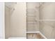 Spacious walk-in closet featuring multiple wire shelves for organization and storage at 5107 Granbury Dr, Durham, NC 27713