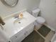 This bathroom features a white sink, neutral walls, and a simple, clean design at 5805 Mapleridge Rd, Raleigh, NC 27609