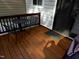 Relaxing deck featuring wood flooring, ideal for outdoor seating and enjoying the surrounding scenery at 5805 Mapleridge Rd, Raleigh, NC 27609