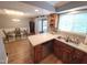 Efficient kitchen area with stainless sink, generous countertop space, and plentiful cabinetry at 5805 Mapleridge Rd, Raleigh, NC 27609