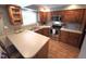 Functional kitchen featuring stainless steel appliances, and ample countertop space at 5805 Mapleridge Rd, Raleigh, NC 27609