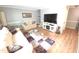 Comfortable living room with hardwood floors and neutral colors, perfect for relaxing at 5805 Mapleridge Rd, Raleigh, NC 27609