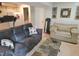 This living room has a comfortable sofa, unique coffee table, and neutral decor throughout at 5805 Mapleridge Rd, Raleigh, NC 27609