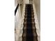 The home includes a staircase with black carpet and white painted risers and rails at 5805 Mapleridge Rd, Raleigh, NC 27609