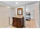 Bathroom featuring vanity with granite countertops, shower, and closet at 6005 Lake Wheeler Rd, Raleigh, NC 27603