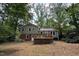 Expansive backyard features a deck and an abundance of space for outdoor activities at 609 Sloan Dr, Cary, NC 27511