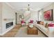 Bright living room with fireplace and decorative accents creating a cozy atmosphere at 610 Callan View Ave, Wake Forest, NC 27587