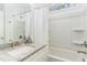 Bathroom featuring a granite vanity top, shower, and bathtub at 620 Rollins Mill Rd, Holly Springs, NC 27540