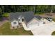 An elevated view of a two-story home with a three-car garage, lovely front yard, and manicured lawn at 620 Rollins Mill Rd, Holly Springs, NC 27540